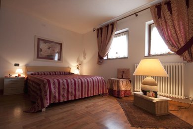 Appartamento turistico Casa delle Rose valle dei Mocheni la stanza da letto